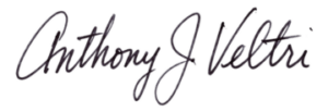 A handwritten signature in black ink reads “Anthony J Veltri” in cursive script on a white background. The letters are flowing and slightly slanted, with large loops, especially in the uppercase “A” and “V.”.