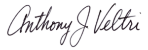 A handwritten signature in black ink reads “Anthony J Veltri” in cursive script on a white background. The letters are flowing and slightly slanted, with large loops, especially in the uppercase “A” and “V.”.
